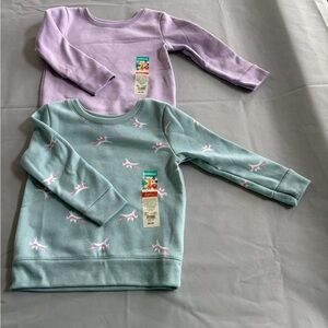 Lot of two. Girls Green Top with Pink Unicorns and purple top